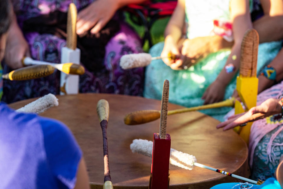 Midsection Of People Playing Drums (Emmanuel Lavigne / EyeEm / Getty Images)