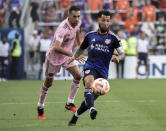 FILE - FC Cincinnati midfielder Luciano Acosta, right, controls the ball during the first half of the team's U.S. Open Cup soccer semifinal against Inter Miami, Aug. 23, 2023, in Cincinnati. Acosta was named the MLS' Most Vlauable Player with 17 goals and 14 assists. He also won Goal of the Year for his clinical right-footed goal against Charlotte after running through a series of defenders. (AP Photo/Joshua A. Bickel, File)