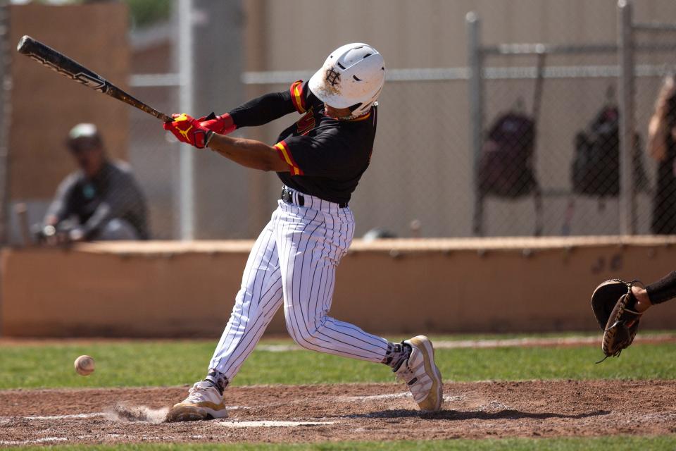 Centennial Hawk Steven Milam bats during the first round of the state baseball playoffs on Saturday, May 6, 2023, at the Field of Dreams.