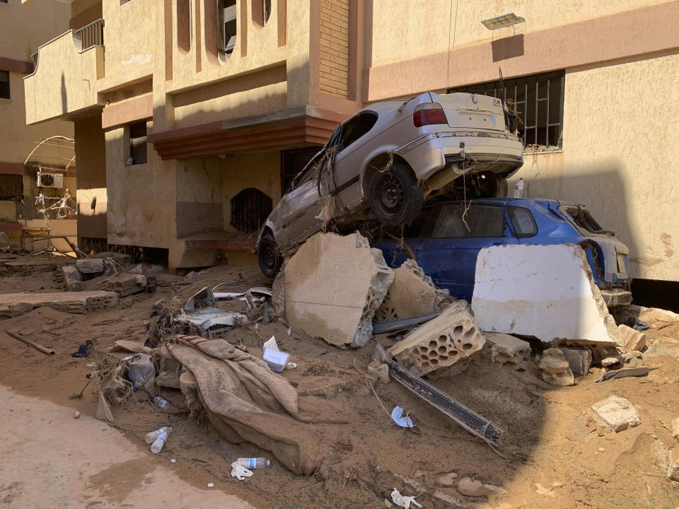 Flooding aftermath is seen in Derna, Libya, Thursday, Sept.14, 2023. Search teams are combing streets, wrecked buildings, and even the sea to look for bodies in Derna, where the collapse of two dams unleashed a massive flash flood that killed thousands of people. (AP Photo/Yousef Murad)