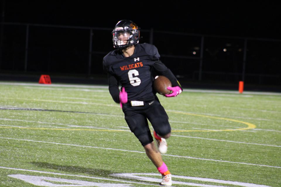 Ayden Sparrow runs the ball for Gardner in a game against Littleton on October 13, 2023.