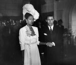 <p>During her fourth wedding to Jo Bouillon, Josephine Baker let her style shine with a dress embellished with flowers and a belt. </p>