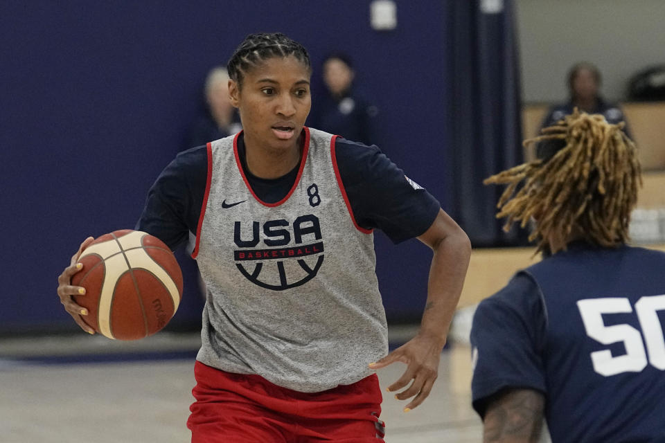 FILE - Team USA player Angel McCoughtry (8) drives during a spring training practice session, Friday, April 1, 2022, in Minneapolis. Black women's players who were coached by a Black woman at some point in their careers have spoken about how crucial that was to their development. (AP Photo/Eric Gay, File)