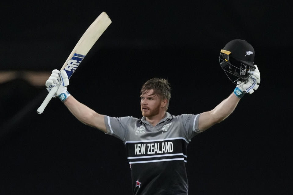 New Zealand's Glenn Phillips celebrate making a century against Sri Lanka during their T20 World Cup Cricket match in Sydney, Australia, Saturday, Oct. 29, 2022. (AP Photo/Mark Baker)