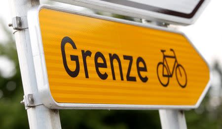 FILE PHOTO: Traffic sign 'border' is pictured in Kirchdorf am Inn, Germany July 18, 2018. REUTERS/Michaela Rehle/File Photo