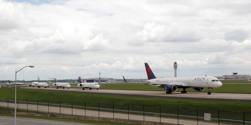 Delta airplanes line up on the taxi way at Hartsfield Jackson Atlanta International Airport in Atlanta, Georgia, U.S. August 8, 2016.  REUTERS/Tami Chappell