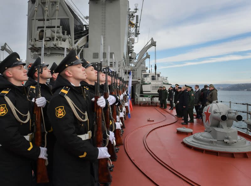 Russian President Vladimir Putin attends the joint drills of the Northern and Black sea fleets on board the Russian guided missile cruiser Marshal Ustinov in Sevastopol