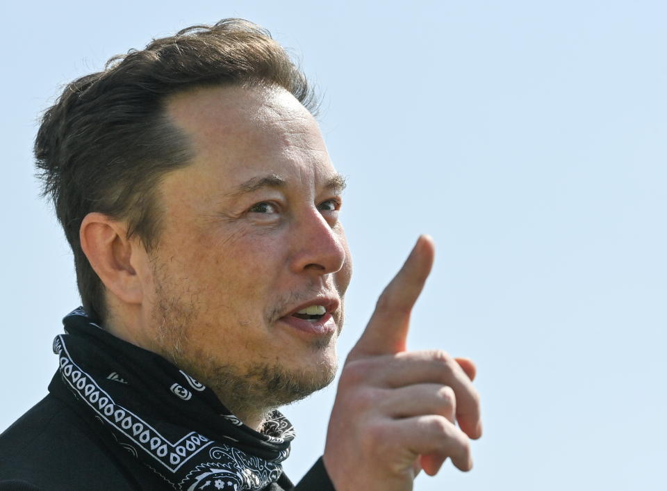 Tesla CEO Elon Musk gestures as he visits the construction site of Tesla's Gigafactory in Gruenheide near Berlin, Germany, August 13, 2021. Patrick Pleul/Pool via Reuters