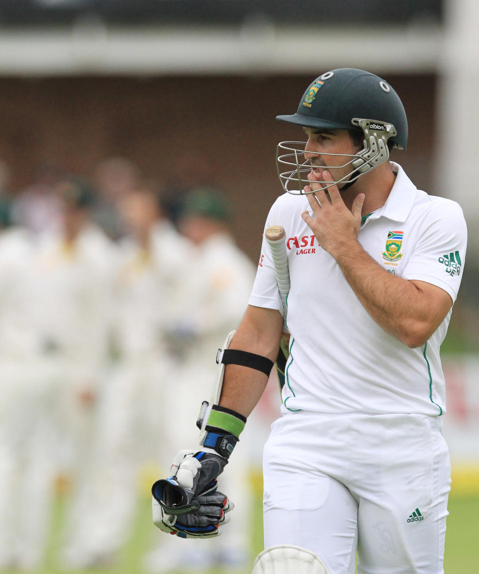 South Africa's batsman Dean Elgar, walks back to the players pavilion after being dismissed by Australia's bowler Nathan Lyon, for 83 runs on the first day of their 2nd cricket test match at St George's Park in Port Elizabeth, South Africa, Thursday, Feb. 20, 2014. (AP Photo/ Themba Hadebe)