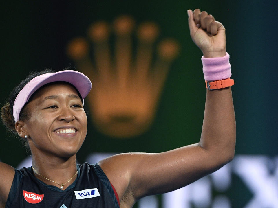 Japan's Naomi Osaka celebrates after defeating Karolina Pliskova of the Czech Republic in their semifinal at the Australian Open tennis championships in Melbourne, Australia, Thursday, Jan. 24, 2019. (AP Photo/Andy Brownbill)