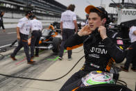 Pato O'Ward of Mexico removes his ear plugs following a practice session for the Indianapolis 500 auto race at Indianapolis Motor Speedway in Indianapolis, Tuesday, May 18, 2021. (AP Photo/Michael Conroy)