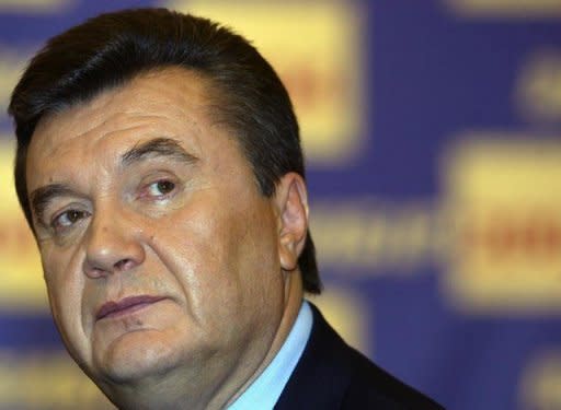 Ukrainian President Viktor Yanukovych, seen here in 2004, has summoned lawmakers for crisis talks to try to defuse the row. Ukrainian police have used tear gas and several people were injured at a chaotic protest against a new language law as the president summoned the leaders of parliament to limit a growing crisis