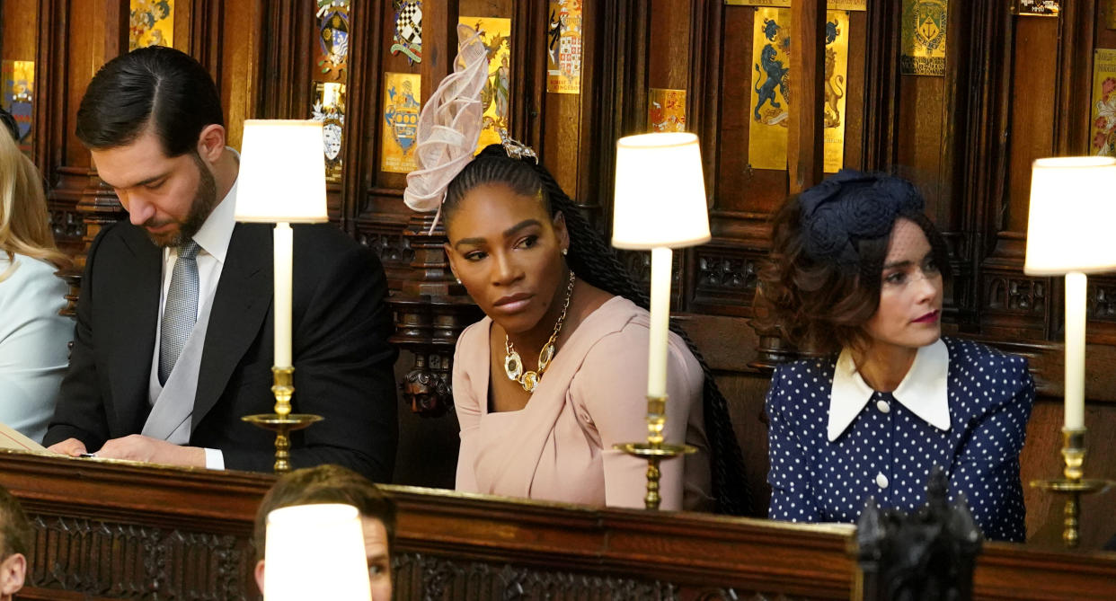 Meghan's friends, Serena Williams and Abigail Spencer sit next to each other at the royal wedding. (Reuters)