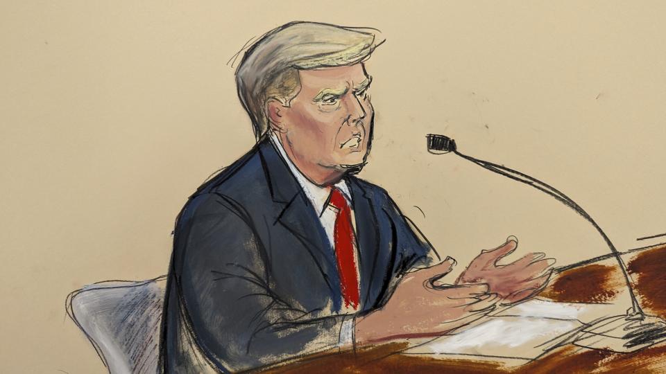 Former President Donald Trump speaks from the defense table to Judge Arthur Engoron at the end of closing arguments by the defense at New York Supreme Court, Thursday, Jan. 11, 2024, in New York. (Elizabeth Williams via AP)
