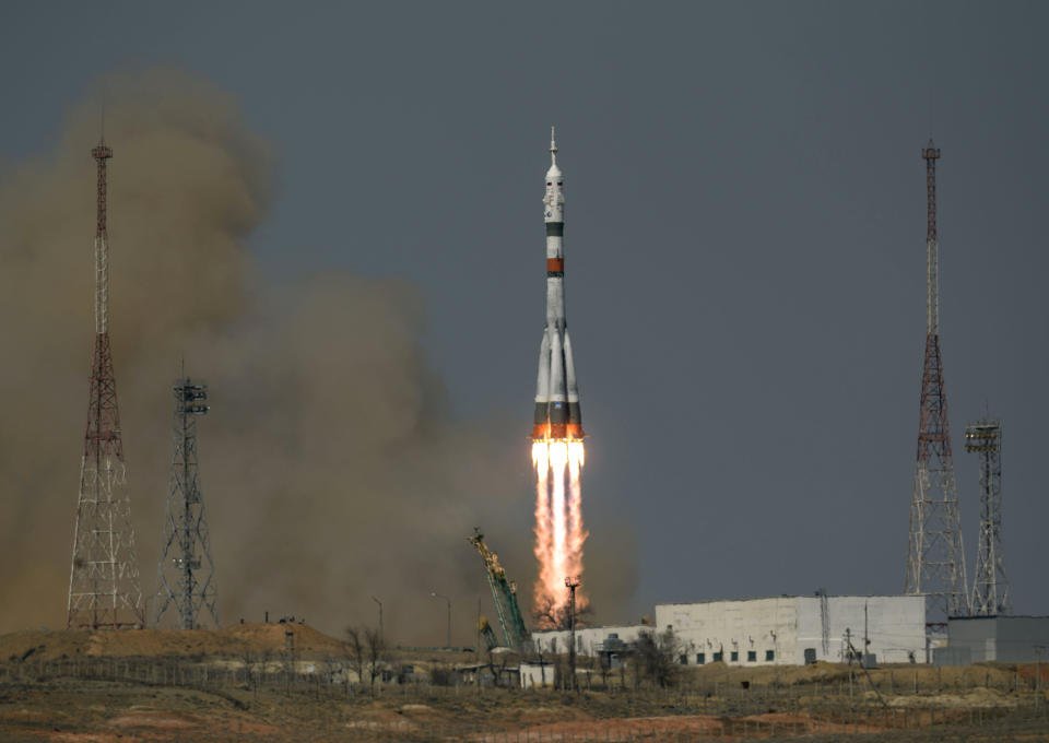 In this image provided by NASA, the Soyuz MS-18 rocket is launched with NASA astronaut Mark Vande Hei, Roscosmos cosmonauts Pyotr Dubrov and Oleg Novitskiy, Friday, April 9, 2021, at the Baikonur Cosmodrome in Kazakhstan. The Russian-U.S. trio of space travelers launched successfully Friday, heading for the International Space Station.(Bill Ingalls/NASA via AP)
