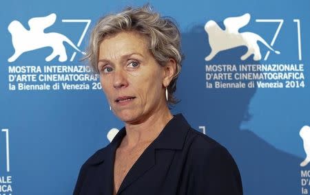 Cast member Frances McDormand poses during a photocall for the TV mini-series "Olive Kitteridge" at the 71st Venice Film Festival September 1, 2014. REUTERS/Tony Gentile