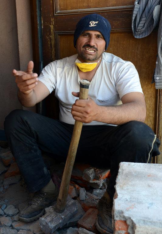 Pakistani refugee Nawid Ahmad, pictured at a construction site in Kathmandu, on March 12, 2014