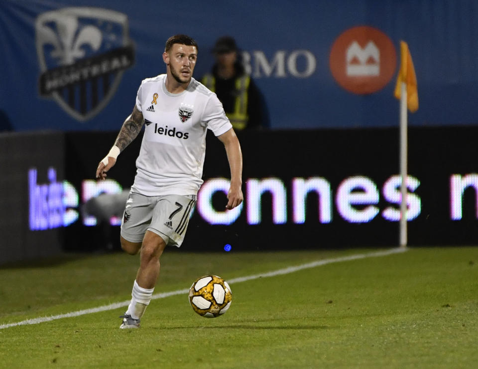 Aug 31, 2019; Montreal, Quebec, CAN; D.C. United midfielder Paul Arriola (7) plays the ball during the second half of the game against the Montreal Impact at Stade Saputo. Mandatory Credit: Eric Bolte-USA TODAY Sports