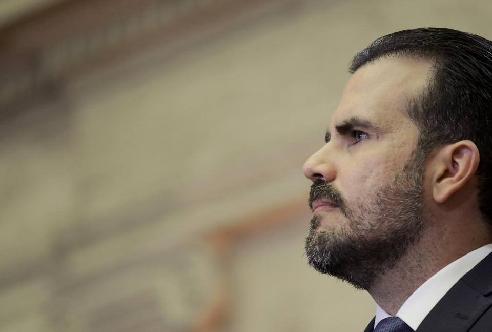 Puerto Rico's Gov. Ricardo Rossello looks out at lawmakers as he delivers his commonwealth address at the seaside Capitol, in San Juan, Puerto Rico, Wednesday, April 24, 2019. Rossello pledged on Wednesday to lift the U.S. territory from a deep recession by creating more jobs, reversing a migration exodus and implementing a range of incentives as the island struggles to recover from Hurricane Maria. (AP Photo/Carlos Giusti)
