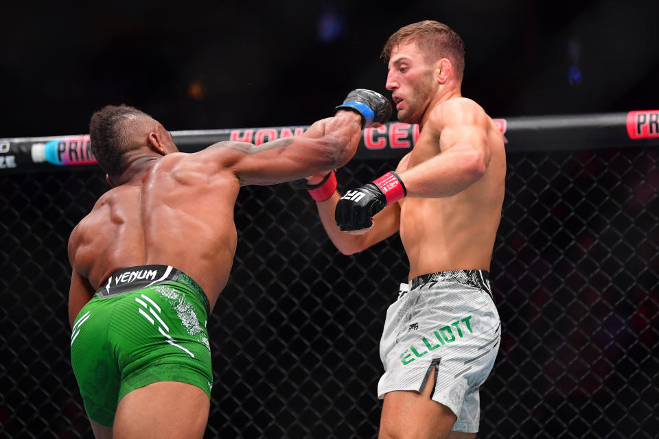 Feb 17, 2024; Anaheim, California, USA; Oban Elliott defends against Val Woodburn during UFC 298 at Honda Center. Mandatory Credit: Gary A. Vasquez-USA TODAY Sports