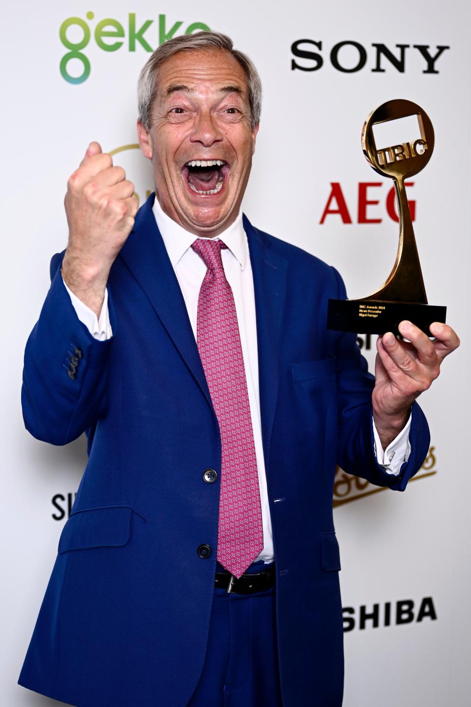 Nigel Farage with the News Presenter Award at The TRIC Awards 2024 at The Grosvenor House Hotel on June 25, 2024 in London (Gareth Cattermole/Getty Images)