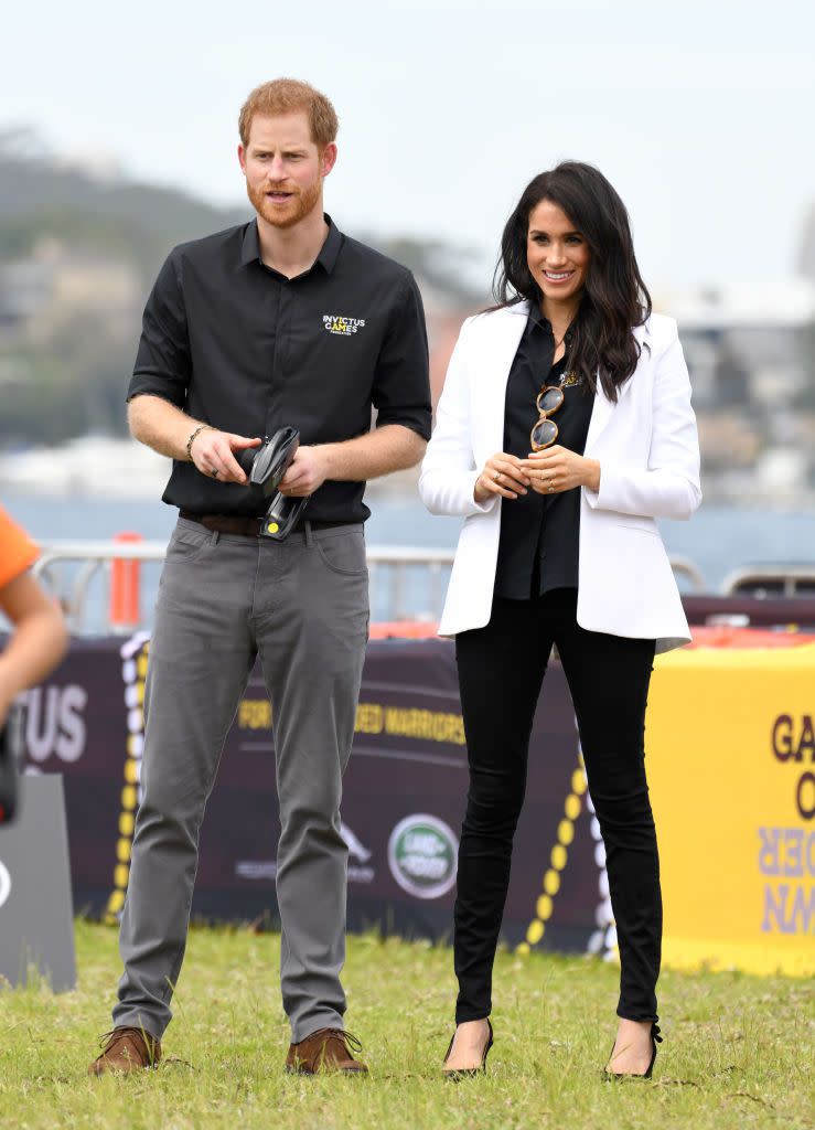 <p><strong>20 October </strong>After a quick outfit change, the Duke and Duchess of Sussex attended the first event of the 2018 Invictus Games dressed in matching t-shirts. The Duchess layered a L’Agence white blazer over the top. </p>