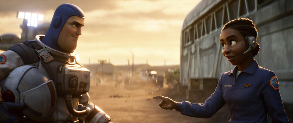 FILE - This image released by Disney/Pixar shows character Buzz Lightyear, voiced by Chris Evans, left, and Alisha Hawthorne, voiced by Uzo Aduba, in a scene from the animated film "Lightyear," releasing June 17, 2022. Authorities across the Muslim world have barred Disney's latest animated film "Lightyear" from being played at cinemas after the inclusion of a brief kiss between a lesbian couple, the company said Thursday, June 16. (Disney/Pixar via AP, File)