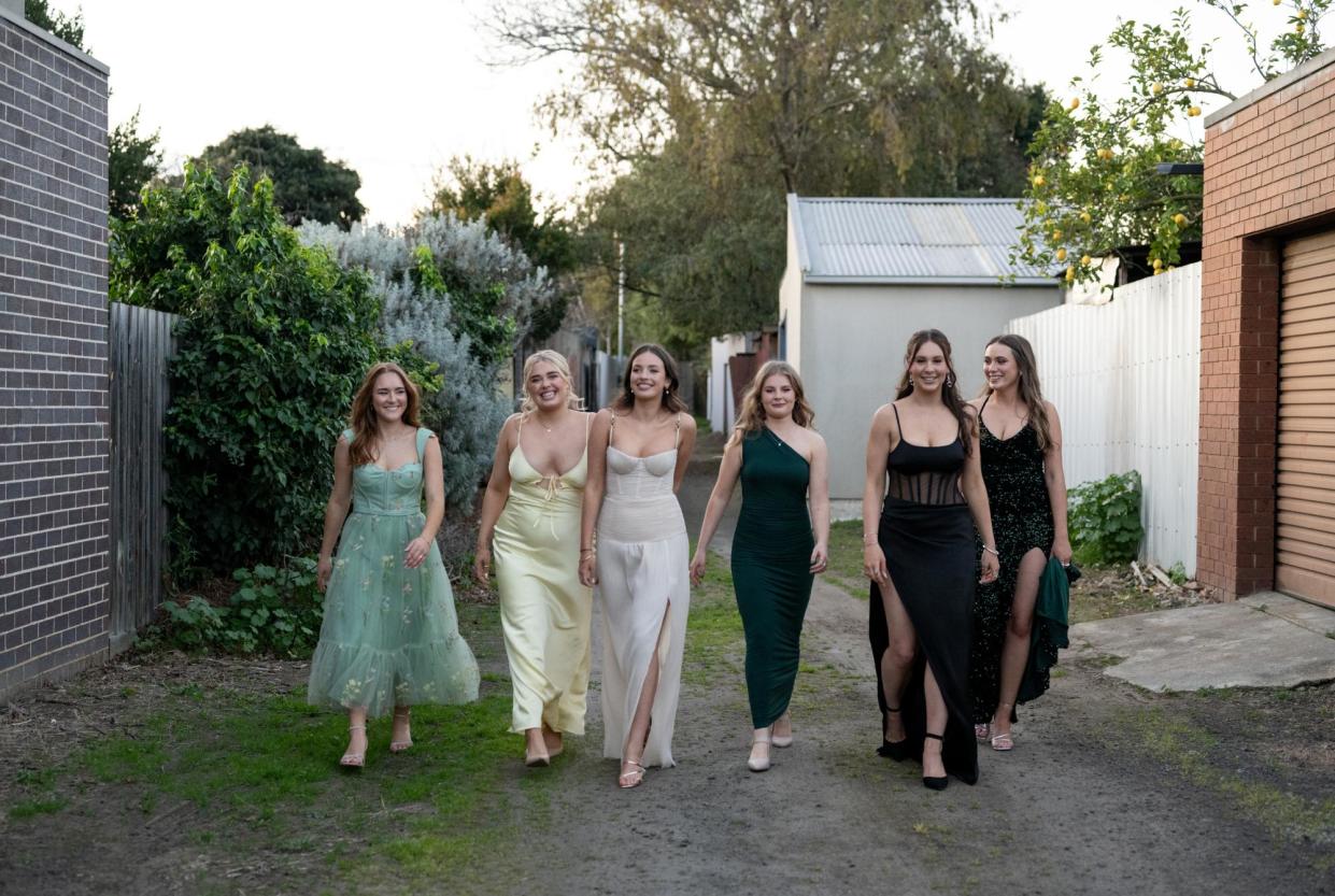 <span>From left, Lucia Pellegrini, Thea Niall, Layla Hicks, Danika Stamp, Isobel Collard and Lily Darling ready for Northcote high’s year 12 formal.</span><span>Photograph: Penny Stephens/Guardian Australia</span>