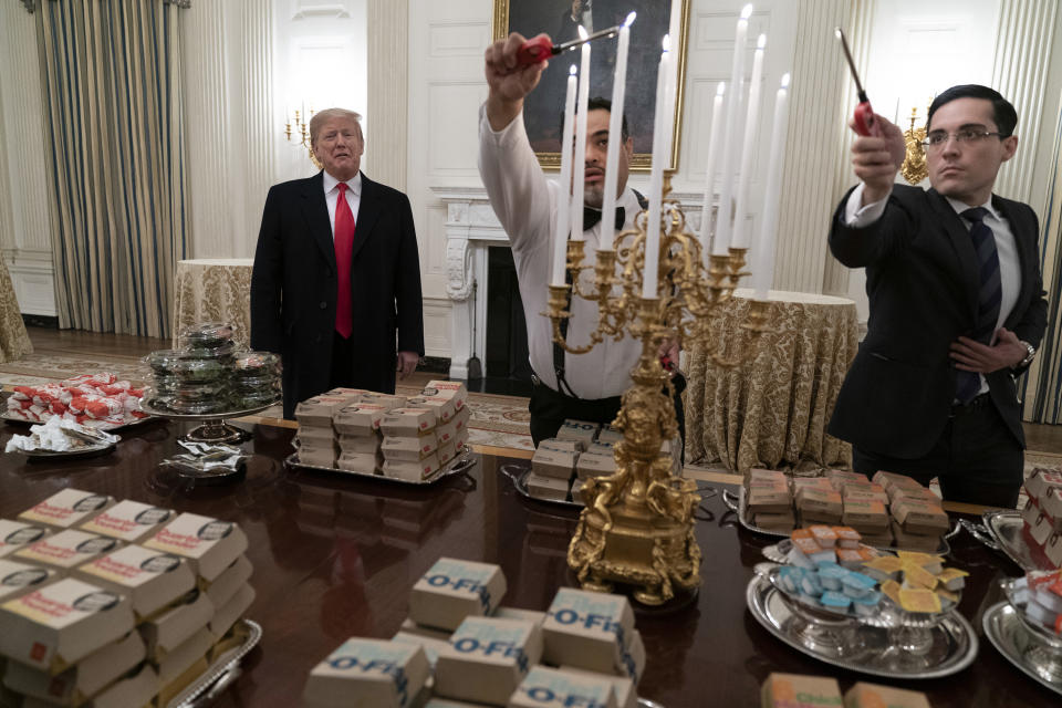 President Donald J. Trump presents fast food to be served to the Clemson Tigers to celebrate their Championship at the White House. (Chris Kleponis / Polaris)