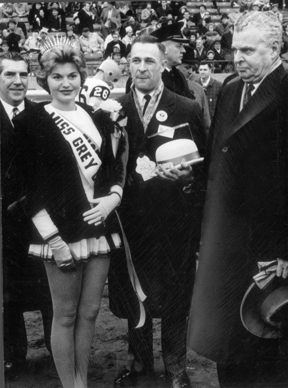 Miss Grey Cup and Prime Minister John Diefenbaker before the 1961 Grey Cup game in Toronto. (The Globe and Mail/The Canadian Press)