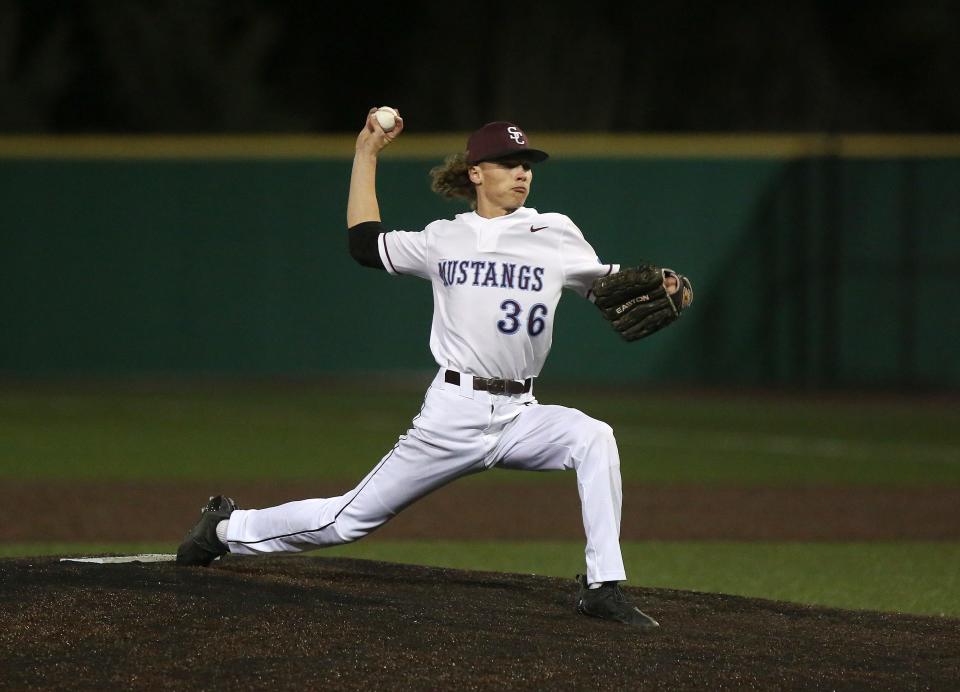 Salina Central Nick Clayson (36) pitches against Salina South during their game Tuesday, April 26, 2022, at Dean Evans Stadium. South defeated Central 10-3. 