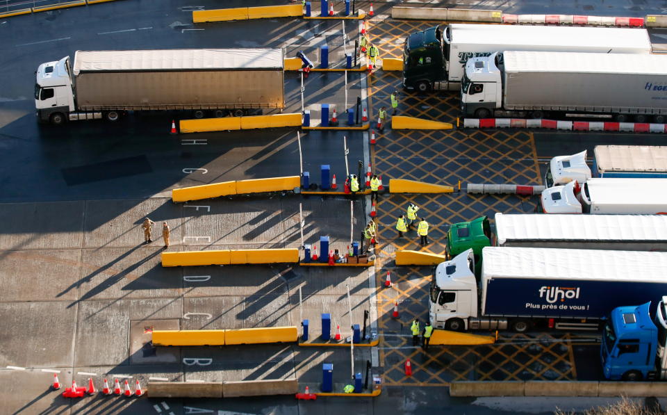 Lorries queue at the Port of Dover following the coronavirus disease (COVID-19) outbreak, in Dover, Britain, December 27, 2020. REUTERS/Peter Cziborra TPX IMAGES OF THE DAY