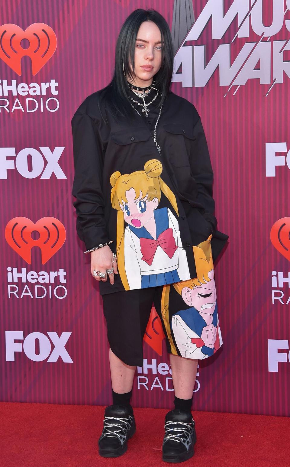 Billie Eilish arrives for the 2019 iHeart Radio Music Awards at the Microsoft theatre on March 14, 2019 in Los Angeles