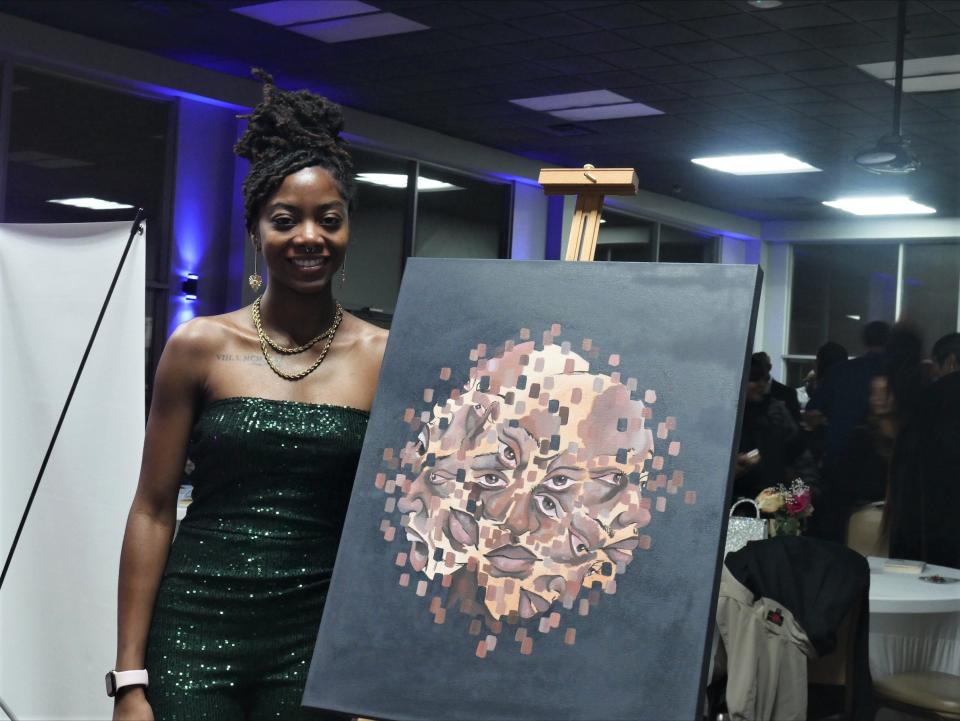 "I did the fragments just to show how broken she was and how broken she still is from something like that happening to her," said 21-year old Detroit artist Kirah Price on the illustration she created during H.U.S.H.'s Painting My Pain fundraising event that featured keynote speaker Faith Green.  Green expressed in chilling details the day her then-husband killed her four children and made her watch the death of two of them.