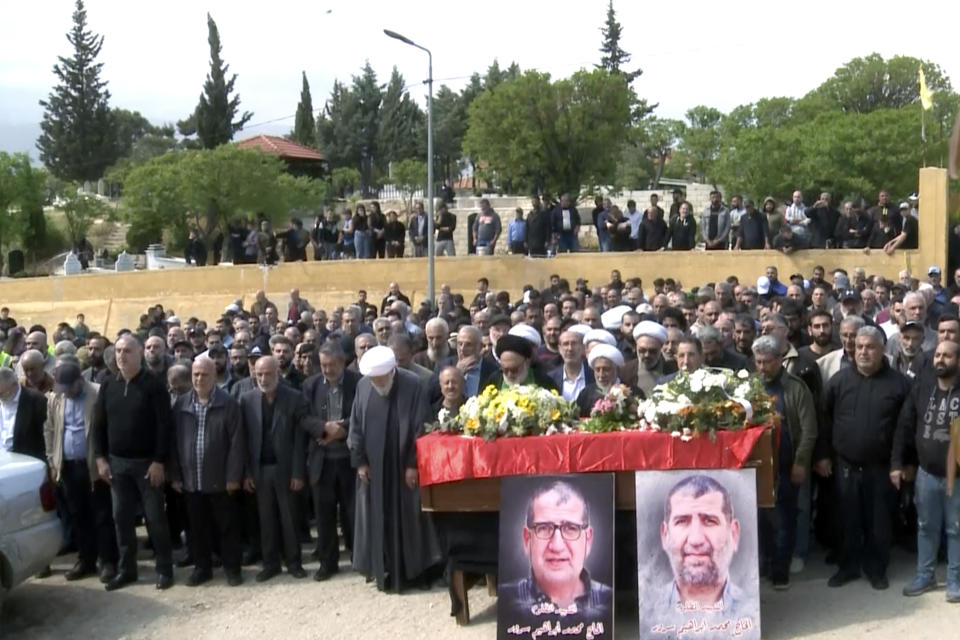 In this grab taken from video, mourners pray over the coffin of Lebanese money changer Mohammad Srour, 57, who was found tortured and killed inside a villa in Monte Verdi neighborhood of Beit Meri, during his funeral procession in Labweh village, near the border with Syria, northeast Lebanon, Thursday, April 11, 2024. Lebanon’s interior minister alleged Wednesday that the mysterious abduction and killing of a Hezbollah-linked Lebanese financier in a villa on the edge of a quiet mountain resort town earlier this month was likely the work of Israeli operatives. (AP Photo)