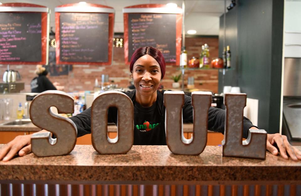 Sharonda Harris-Bunton, owner of Vegans Are Us in Vineland, prepares 100% plant-based soul food during a lunch rush in this Courier Post file photo.