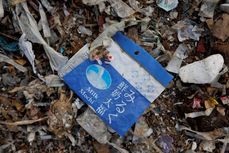 The Wider Image: Cash for trash: Indonesia village banks on waste recycling