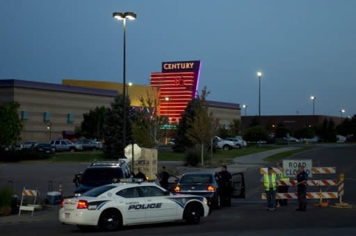 Police outside the theater in Aurora, Colorado, where 12 people were killed on July 20. A graduate student who told police he was the Joker opened fire in a theater showing the premiere of the latest Batman movie