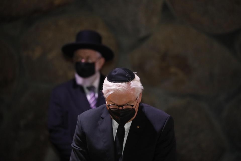 German President Frank-Walter Steinmeier visits the Hall of Remembrance at the Yad Vashem Holocaust memorial in Jerusalem, Thursday, July 1, 2021. (AP Photo/Ariel Schalit)