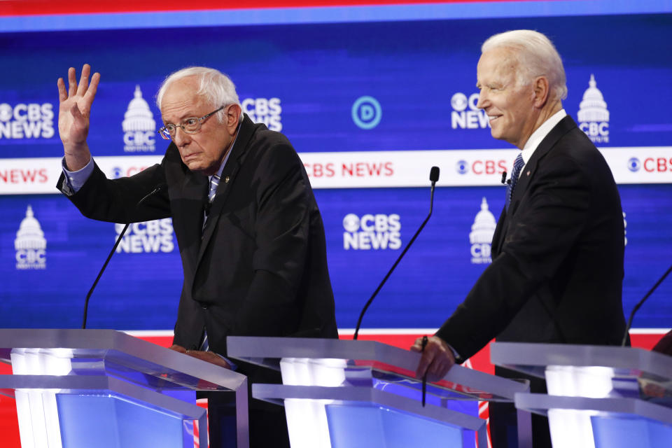 Democratic presidential candidates, Sen. Bernie Sanders, I-Vt., left, and former Vice President Joe Biden, right, participate in a Democratic presidential primary debate at the Gaillard Center, Tuesday, Feb. 25, 2020, in Charleston, S.C., co-hosted by CBS News and the Congressional Black Caucus Institute. (AP Photo/Patrick Semansky)