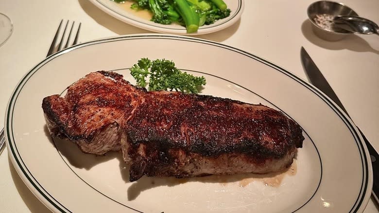 steak on plate with parsley