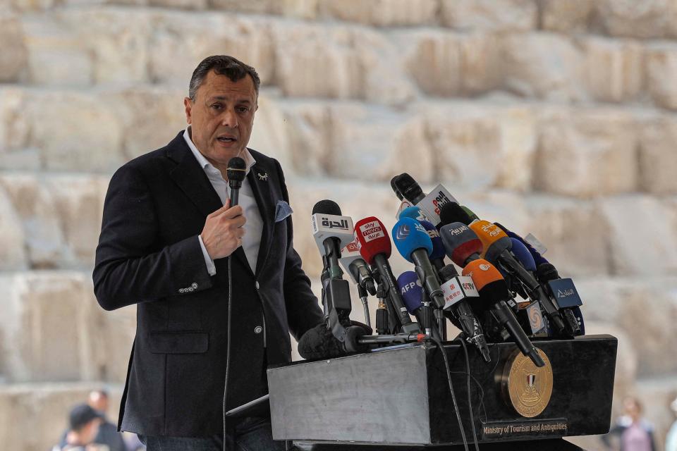 Egypt's Minister of Tourism and Antiquities Ahmed Issa gives a news conference in front of the Great Pyramid of Khufu (Cheops) at the Giza Pyramids necropolis on the southwestern outskirts of Cairo, on March 2, 2023.