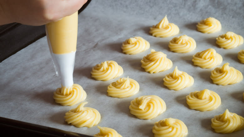 Piping choux pastry