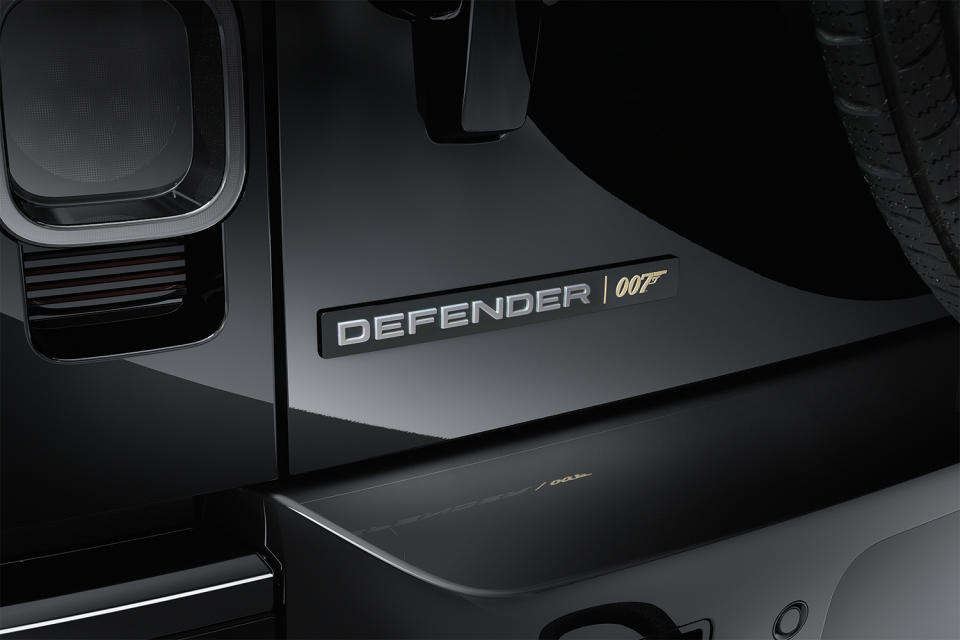 The Defender and James Bond 007 logo on the back of an all-black Land Rover Defender V8 SUV inspired by "No Time to Die"