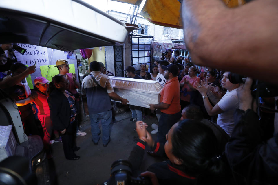 The casket with the body of Fatima, a 7-year-old girl who was abducted from the entrance of the Enrique C. Rebsamen primary school and later killed, arrives for her wake at her home in Mexico City, Monday, Feb. 17, 2020. The girl's body was found wrapped in a bag and abandoned in a rural area on Saturday and was identified by genetic testing. (AP Photo/Marco Ugarte)