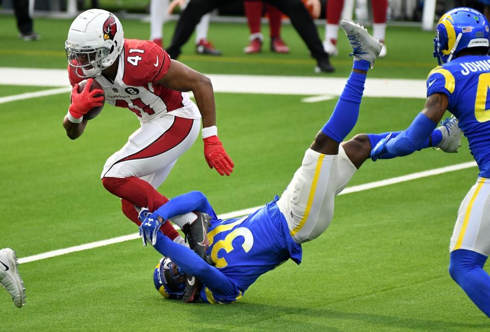 Rams cornerback Darious Williams makes a tackle on Cardinals running back Kenyan Drake.