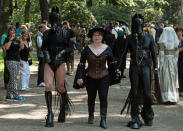 <p>Participants of the so called “Victorian Picnic” walk in fancy costumes during the Wave Gothic Festival (WGT) in Leipzig, Germany, Friday, June 2, 2017. (AP Photo/Jens Meyer) </p>