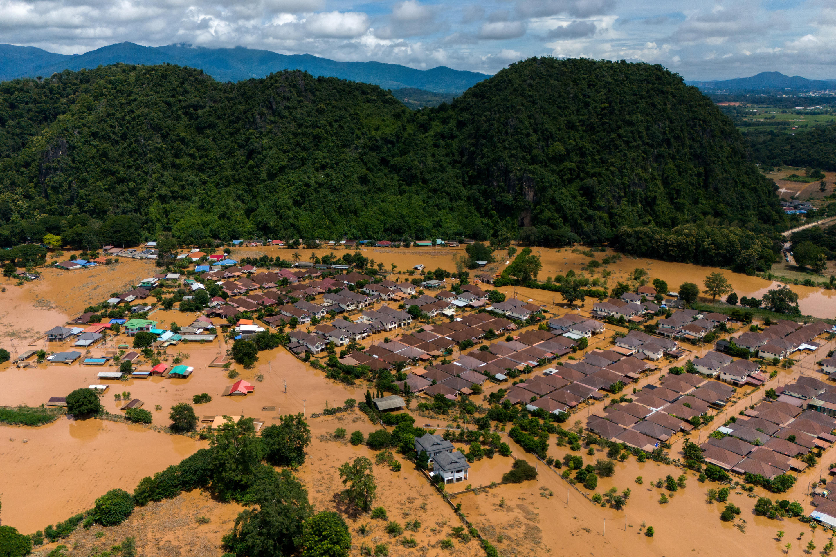 A drone footage shows a flooded village in Chiang Rai in Thailand's northern province on Friday. (Anupong Intawong/Reuters)