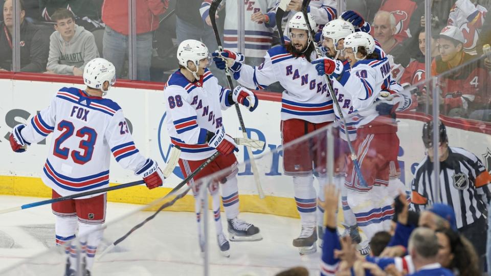 Apr 20, 2023; Newark, New Jersey, USA; New York Rangers left wing Chris Kreider (20) celebrates his goal with teammates during the second period in game two of the first round of the 2023 Stanley Cup Playoffs against the New Jersey Devils at Prudential Center.