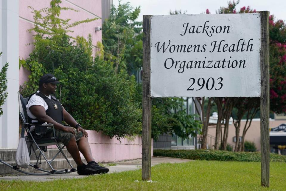 A member of the security force sits outside the Jackson Women’s Health Organization clinic in Jackson, Miss., Thursday, June 30, 2022. (AP Photo/Rogelio V. Solis)